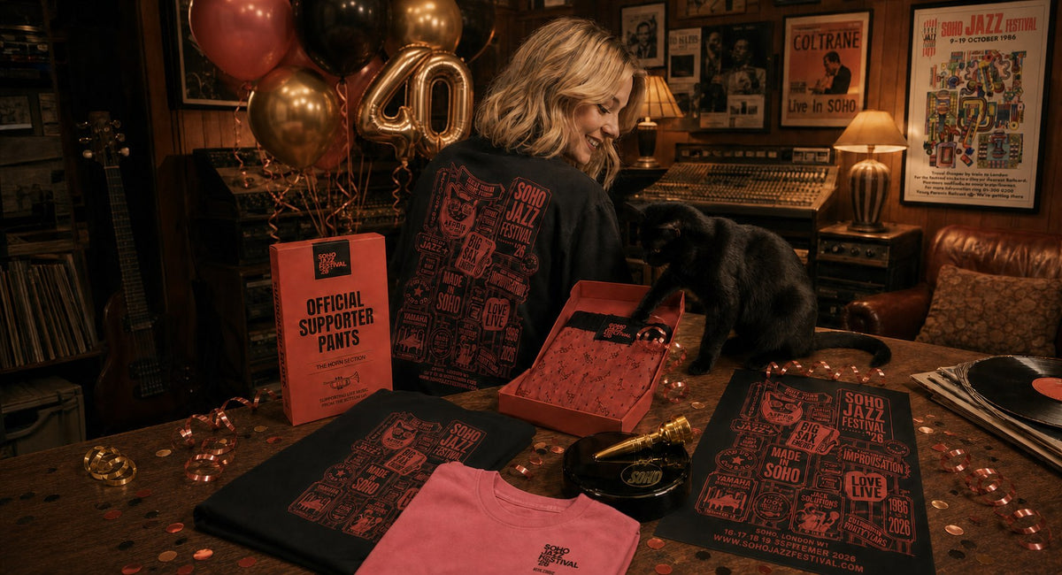 Soho Jazz Festival '26 collection, tees, poster, supporter pants and Top Brass on a Soho studio table