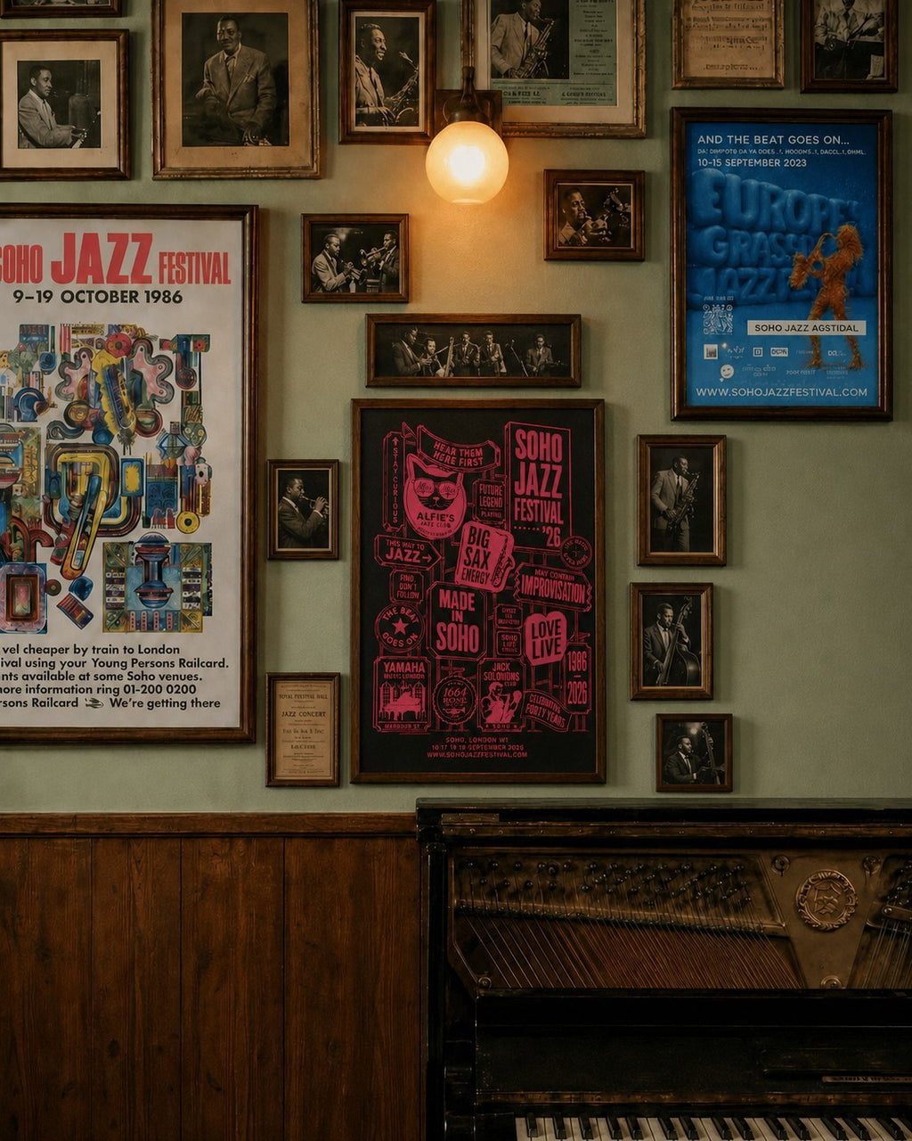 The 40th Print framed on a Soho bar wall beside past festival posters