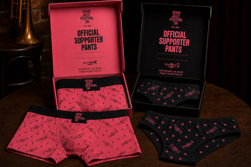 Soho Jazz Festival 2026 Official Supporter Pants, watermelon boxer briefs and black briefs with their boxes on a Soho bar table