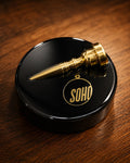 Top Brass, a brass trumpet mouthpiece and Soho key plaque set in a black piano gloss resin disc